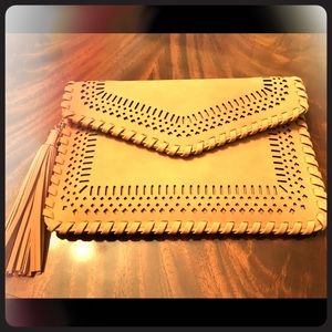 Cute clutch with removable cross body strap